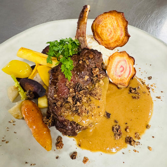 Christmas: Main course: Venison ribs with fillet, spiced crumble, Liège syrup sauce, medley of forgotten vegetables and potato gratin with celeriac